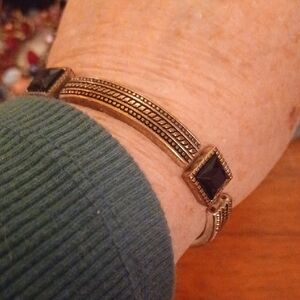Elegant Gold and Black Bracelet